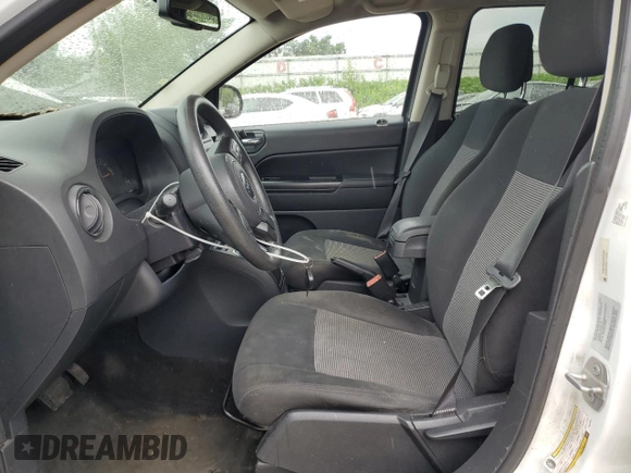 2016 Jeep Compass Sport with VIN 1C4NJDBB0GD520307, listed as a Copart auction lot 63024615 with 165,711 mi miles and Clean title. Bid and sale history available at DreamBid. Image 7.