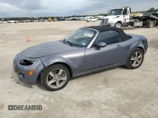 2007 Mazda MX-5 Miata Sport z VIN JM1NC25F170133320, wystawiony jako Copart lot #88883175 z przebiegiem 140 411 mil mil oraz Szkoda całkowita • Salvage title. Historia ofert i sprzedaży dostępna na DreamBid. Obrazek 1.