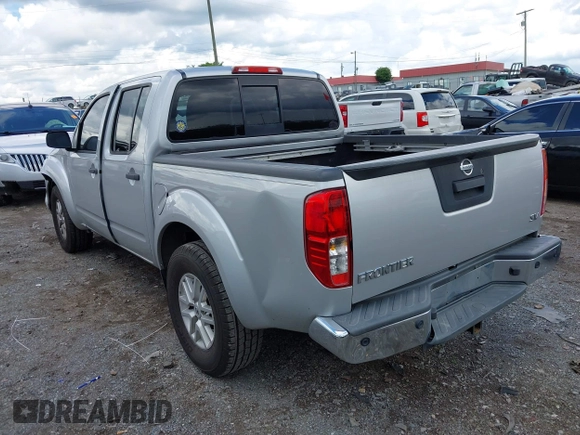 2014 Nissan Frontier SV with VIN 1N6AD0ER0EN762140, listed as a IAAI auction lot 42214106 with 188,824 mi miles and . Bid and sale history available at DreamBid. Image 3.