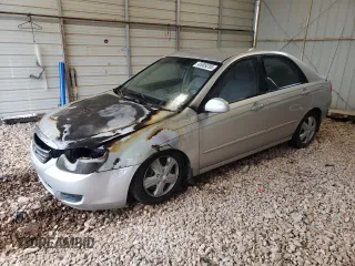 2009 Kia Spectra EX with VIN KNAFE221595603150, listed as a Copart auction lot 45009285 with 0 mi miles and Salvage Title. Bid and sale history available at carsss.com. Image 1.
