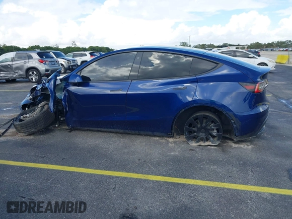 2021 Tesla Model Y Standard Range with VIN 5YJYGDED4MF112857, listed as a IAAI auction lot 41134600 with Not Provided miles and . Bid and sale history available at DreamBid. Image 13.