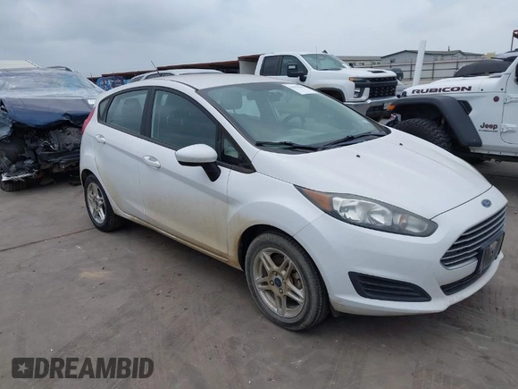 2019 Ford Fiesta SE with VIN 3FADP4EJ2KM157184, listed as a IAAI auction lot 41970286 with 68,900 mi miles. Bid and sale history available at carsss.com. Image 1.