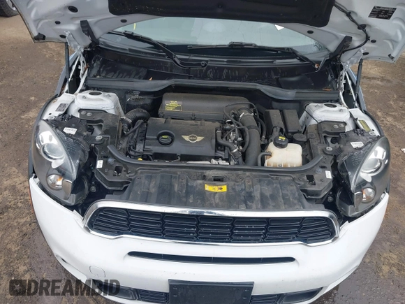 2014 MINI Countryman S with VIN WMWZC3C55EWP52138, listed as a IAAI auction lot 40695292 with 83,083 mi miles and . Bid and sale history available at DreamBid. Image 10.