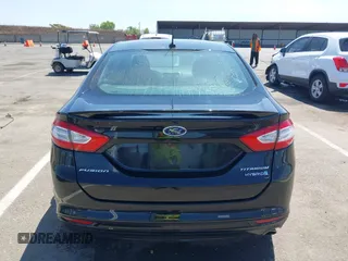 2016 Ford Fusion Titanium Hybrid z VIN 3FA6P0RUXGR123445, wystawiony jako IAAI lot #42606596 z przebiegiem 145 541 mil mil oraz . Historia ofert i sprzedaży dostępna na DreamBid. Obrazek 17.