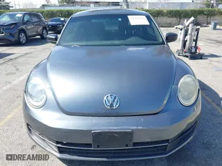 2012 Volkswagen Beetle Entry PZEV with VIN 3VWFP7ATXCM645079, listed as a IAAI auction lot 41593451 with 133,377 mi miles. Bid and sale history available at carsss.com. Image 12.