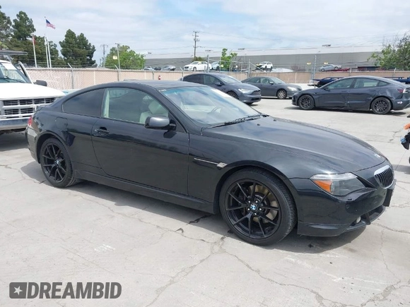 2006 BMW 6 Series 650Ci with VIN WBAEH13436CR50523, listed as a IAAI auction lot 42046873 with 111,765 mi miles. Bid and sale history available at carsss.com. Image 1.