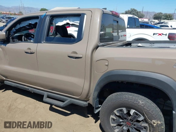 2023 Nissan Frontier Pro-X with VIN 1N6ED1EJ1PN615328, listed as a IAAI auction lot 39972686 with 15,981 mi miles and . Bid and sale history available at DreamBid. Image 14.