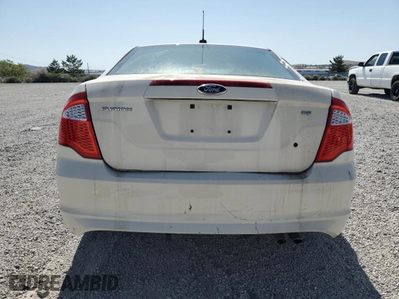 2012 Ford Fusion SE с VIN 3FAHP0HA2CR182256, выставлен на аукционе Copart как лот 57123785 с пробегом 153 988 миль миль и Списание • Salvage title. История ставок и продаж доступна на DreamBid. Изображение 6.