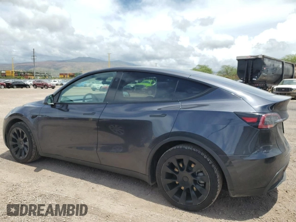 2024 Tesla Model Y Long Range with VIN 7SAYGAEE5RF088151, listed as a Copart auction lot 52651015 with 6,185 mi miles and Clean title. Bid and sale history available at DreamBid. Image 2.