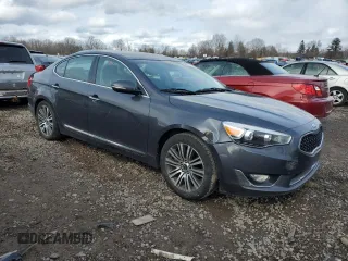 2014 Kia Cadenza Premium with VIN KNALN4D70E5131854, listed as a Copart auction lot 50291935 with 136,862 mi miles and Salvage Title. Bid and sale history available at DreamBid. Image 4.