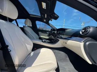 2018 Mercedes-Benz E-Class E 300 with VIN WDDZF4KB2JA346869, listed as a Copart auction lot 54387445 with 125,149 mi miles and Clean Title. Bid and sale history available at carsss.com. Image 5.