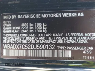 2013 BMW 3 Series 335i with VIN WBADX7C52DJ590132, listed as a IAAI auction lot 41486602 with 154,984 mi miles and . Bid and sale history available at DreamBid. Image 9.