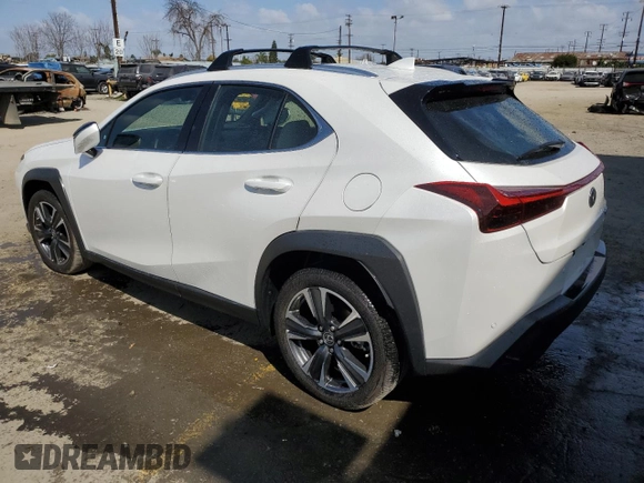 2024 Lexus UX with VIN JTHX6JBHXR2168962, listed as a Copart auction lot 51153075 with 7,080 mi miles and Salvage Title. Bid and sale history available at carsss.com. Image 2.