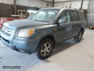 2007 Honda Pilot EX-L with VIN 5FNYF28647B004098, listed as a IAAI auction lot 41404472 with 319,747 mi miles. Bid and sale history available at carsss.com. Image 2.