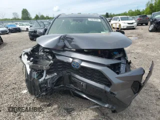 2023 Toyota RAV4 Hybrid SE with VIN JTM16RFVXPD088729, listed as a Copart auction lot 57879395 with 33,249 mi miles and Salvage title. Bid and sale history available at DreamBid. Image 5.