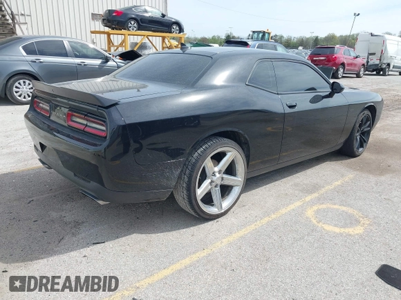 2016 Dodge Challenger R/T Plus with VIN 2C3CDZBT7GH177992, listed as a IAAI auction lot 42136475 with 132,808 mi miles and . Bid and sale history available at DreamBid. Image 4.
