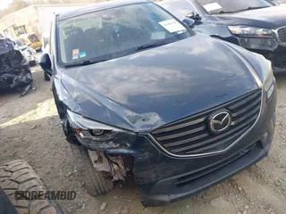 2016 Mazda CX-5 Grand Touring with VIN JM3KE2DY1G0708572, listed as a IAAI auction lot 41685298 with 109,427 mi miles. Bid and sale history available at carsss.com. Image 1.