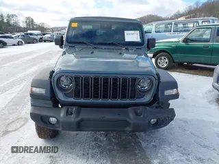 2024 Jeep Wrangler Sport S with VIN 1C4PJXDN2RW306332, listed as a IAAI auction lot 41036573 with 1,785 mi miles and . Bid and sale history available at DreamBid. Image 12.