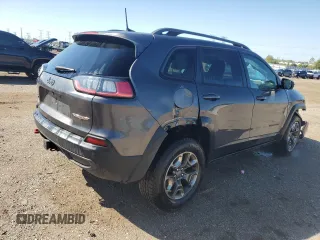 2019 Jeep Cherokee Trailhawk with VIN 1C4PJMBX1KD207294, listed as a Copart auction lot 72694824 with 93,311 mi miles and Salvage Title. Bid and sale history available at DreamBid. Image 3.