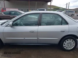 2001 Honda Accord LX z VIN 1HGCG56491A098359, wystawiony jako IAAI lot #42021768 z przebiegiem 122 121 mil mil oraz . Historia ofert i sprzedaży dostępna na DreamBid. Obrazek 14.