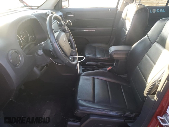 2010 Jeep Patriot Limited with VIN 1J4NF4GB6AD555607, listed as a Copart auction lot 82684464 with 83,915 mi miles and Salvage Title. Bid and sale history available at DreamBid. Image 7.