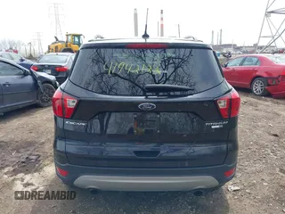 2019 Ford Escape Titanium with VIN 1FMCU9J91KUC42161, listed as a IAAI auction lot 41942122 with 100,677 mi miles and . Bid and sale history available at DreamBid. Image 16.