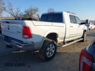 2014 Ram 2500 Longhorn with VIN 3C6UR5PL7EG191298, listed as a IAAI auction lot 40978191 with 156,686 mi miles. Bid and sale history available at carsss.com. Image 4.