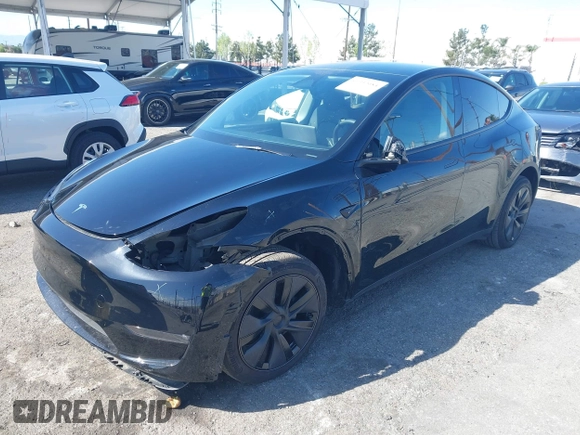 2025 Tesla Model Y Long Range with VIN 7SAYGDEE9SF278607, listed as a IAAI auction lot 41932084 with 9,667 mi miles and . Bid and sale history available at carsss.com. Image 18.