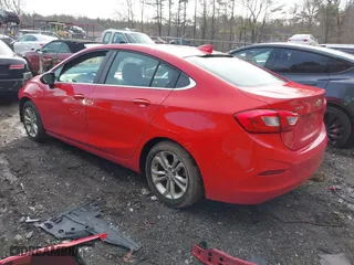 2019 Chevrolet Cruze LT with VIN 1G1BE5SM3K7125276, listed as a IAAI auction lot 41804634 with 133,838 mi miles. Bid and sale history available at carsss.com. Image 3.