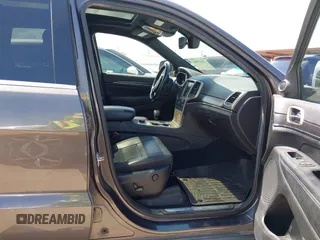 2014 Jeep Grand Cherokee Limited with VIN 1C4RJFBT0EC241030, listed as a IAAI auction lot 42617051 with 104,370 mi miles and . Bid and sale history available at DreamBid. Image 5.