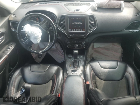 2019 Jeep Cherokee Trailhawk with VIN 1C4PJMBX6KD425554, listed as a Copart auction lot 61097135 with 97,452 mi miles and Salvage title. Bid and sale history available at DreamBid. Image 8.