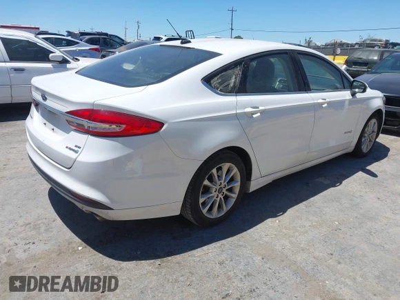 2017 Ford Fusion Hybrid SE with VIN 3FA6P0LU3HR326980, listed as a IAAI auction lot 42692591 with 141,122 mi miles and . Bid and sale history available at DreamBid. Image 4.