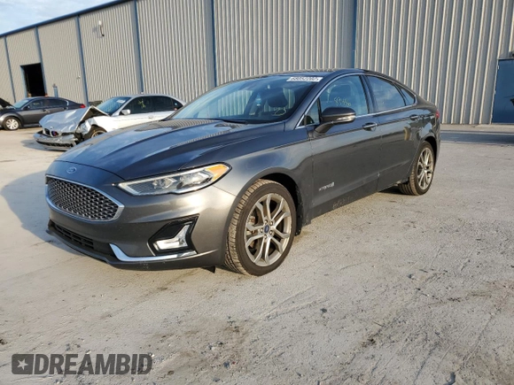 2019 Ford Fusion Hybrid Titanium with VIN 3FA6P0RU9KR116785, listed as a Copart auction lot 68052202 with 89,486 mi miles. Bid and sale history available at carsss.com. Image 1.