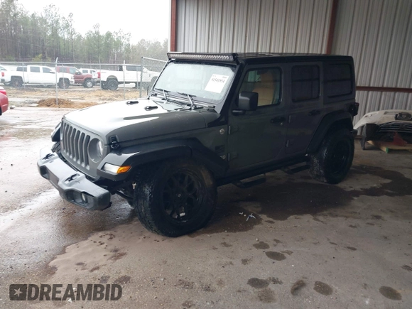 2020 Jeep Wrangler Unlimited Sport S z VIN 1C4HJXDG1LW103364, wystawiony jako IAAI lot #41541954 z przebiegiem 57 735 mil mil oraz . Historia ofert i sprzedaży dostępna na DreamBid. Obrazek 19.
