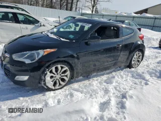 2012 Hyundai Veloster w/Gray Int с VIN KMHTC6AD1CU053050, выставлен на аукционе Copart как лот 44810925 с пробегом 152 962 миль миль и Чистый • Clean title. История ставок и продаж доступна на DreamBid. Изображение 1.