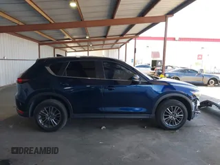 2020 Mazda CX-5 Touring z VIN JM3KFACM2L0802461, wystawiony jako IAAI lot #42148039 z przebiegiem 57 963 mil mil oraz . Historia ofert i sprzedaży dostępna na DreamBid. Obrazek 14.