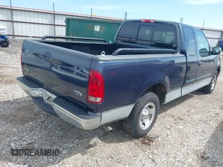 2000 Ford F-150 XL with VIN 1FTRX17W1YKA06683, listed as a IAAI auction lot 42118268 with 1 mi miles. Bid and sale history available at carsss.com. Image 4.