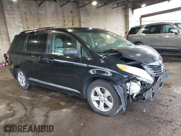 2014 Toyota Sienna LE AAS with VIN 5TDKK3DC7ES426751, listed as a IAAI auction lot 41975870 with 100,000 mi miles and . Bid and sale history available at carsss.com. Image 1.