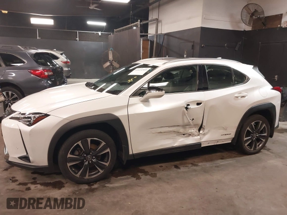 2021 Lexus UX 250h z VIN JTHP9JBH7M2051534, wystawiony jako IAAI lot #41624505 z przebiegiem 29 569 mil mil oraz . Historia ofert i sprzedaży dostępna na DreamBid. Obrazek 6.