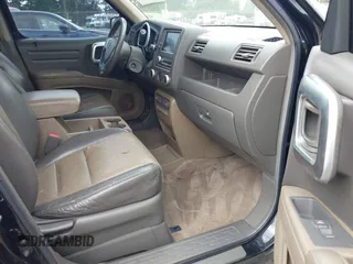 2006 Honda Ridgeline RTL with VIN 2HJYK16526H517466, listed as a IAAI auction lot 42737202 with 184,856 mi miles and . Bid and sale history available at DreamBid. Image 5.