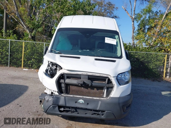 2020 Ford Transit Cargo with VIN 1FTBW1X82LKB49009, listed as a IAAI auction lot 41527513 with 52,802 mi miles and . Bid and sale history available at DreamBid. Image 13.
