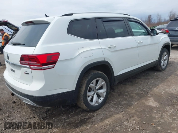 2019 Volkswagen Atlas S with VIN 1V2GR2CA0KC599079, listed as a IAAI auction lot 42062041 with 99,794 mi miles and . Bid and sale history available at DreamBid. Image 4.