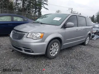 2016 Chrysler Town & Country Touring with VIN 2C4RC1BG4GR292735, listed as a IAAI auction lot 41931677 with 140,708 mi miles. Bid and sale history available at carsss.com. Image 2.