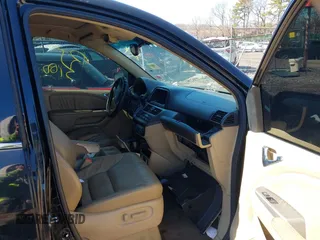 2009 Honda Odyssey EX-L with VIN 5FNRL38759B055396, listed as a IAAI auction lot 41863703 with 999,999 mi miles. Bid and sale history available at carsss.com. Image 5.