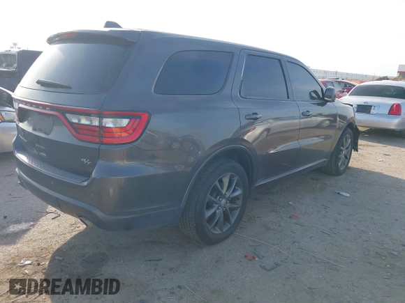 2015 Dodge Durango R/T with VIN 1C4SDHCT8FC833943, listed as a IAAI auction lot 41898447 with 209,999 mi miles and . Bid and sale history available at DreamBid. Image 4.