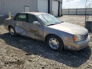 2002 Cadillac DeVille DHS z VIN 1G6KE57Y32U107755, wystawiony jako Copart lot #52811235 z przebiegiem 111 141 mil mil oraz Nie do naprawy. Historia ofert i sprzedaży dostępna na DreamBid. Obrazek 4.