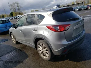 2015 Mazda CX-5 Grand Touring with VIN JM3KE2DY5F0507904, listed as a Copart auction lot 50542895 with 160,736 mi miles and Salvage Title. Bid and sale history available at carsss.com. Image 2.