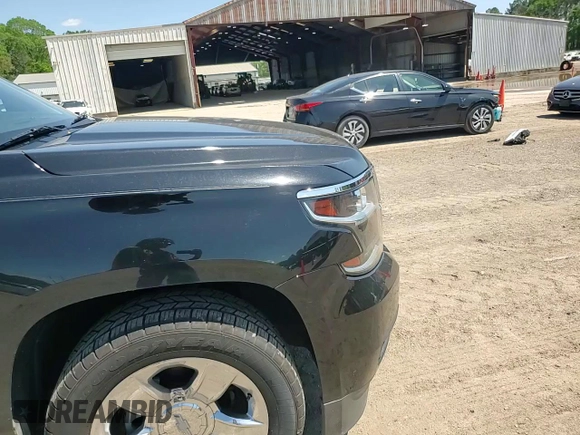 2016 Chevrolet Tahoe LT z VIN 1GNSCBKC2GR479117, wystawiony jako Copart lot #52332955 z przebiegiem 95 161 mil mil oraz Szkoda całkowita • Salvage title. Historia ofert i sprzedaży dostępna na DreamBid. Obrazek 11.