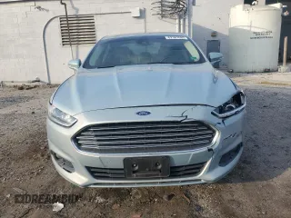 2013 Ford Fusion SE Hybrid z VIN 3FA6P0LU7DR368711, wystawiony jako Copart lot #62367685 z przebiegiem 155 284 mil mil oraz Czysty tytuł • Clean title. Historia ofert i sprzedaży dostępna na DreamBid. Obrazek 5.