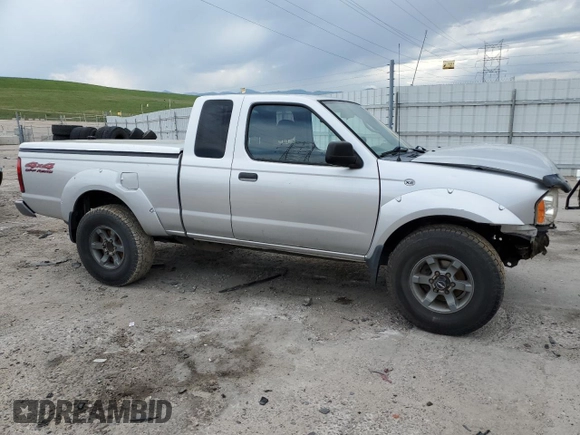 2004 Nissan Frontier XE Desert Runner with VIN 1N6ED26Y44C402138, listed as a Copart auction lot 58828425 with 125,143 mi miles and Salvage title. Bid and sale history available at DreamBid. Image 4.